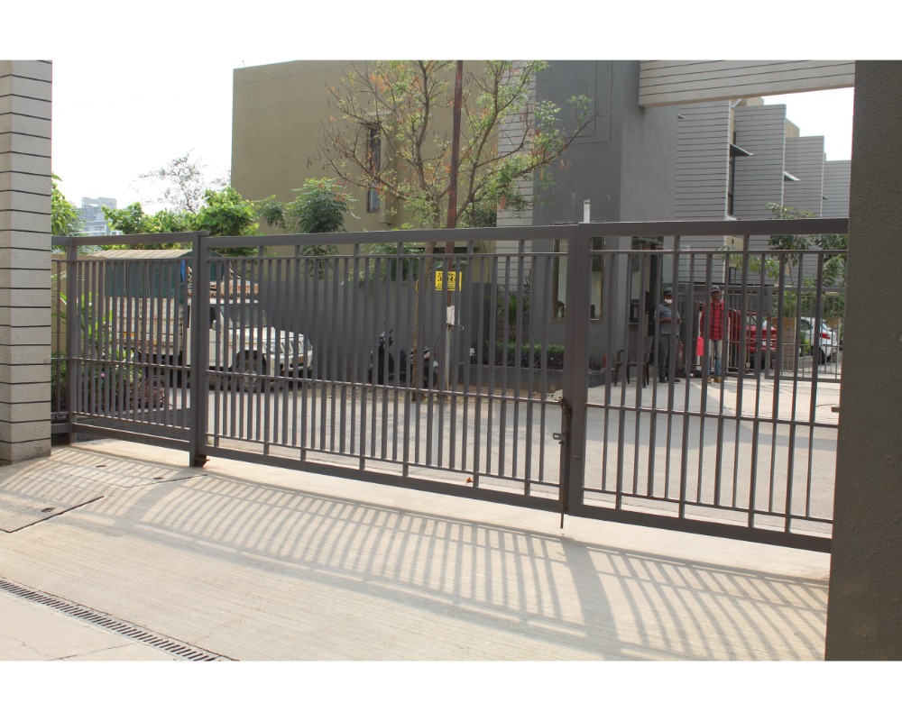 Illustration depicting a modern office entrance gate designed by Om Engineers (Fabricator), featuring sleek lines, geometric patterns, and the company logo. The gate exudes professionalism and sophistication, setting the tone for the corporate environment.
